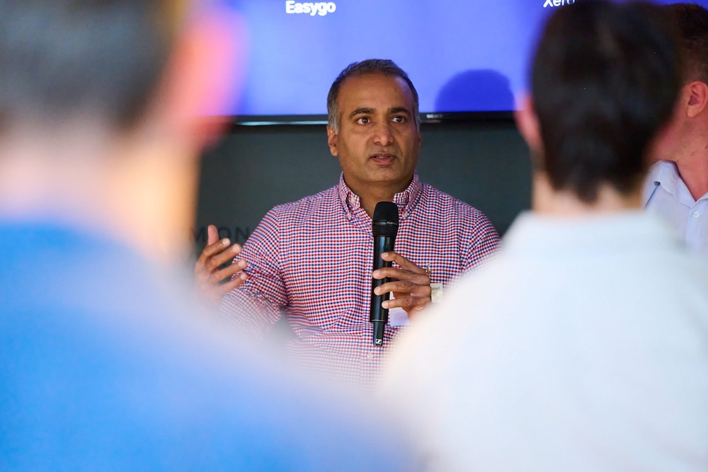 Kunal Kalra speaking at a professional event